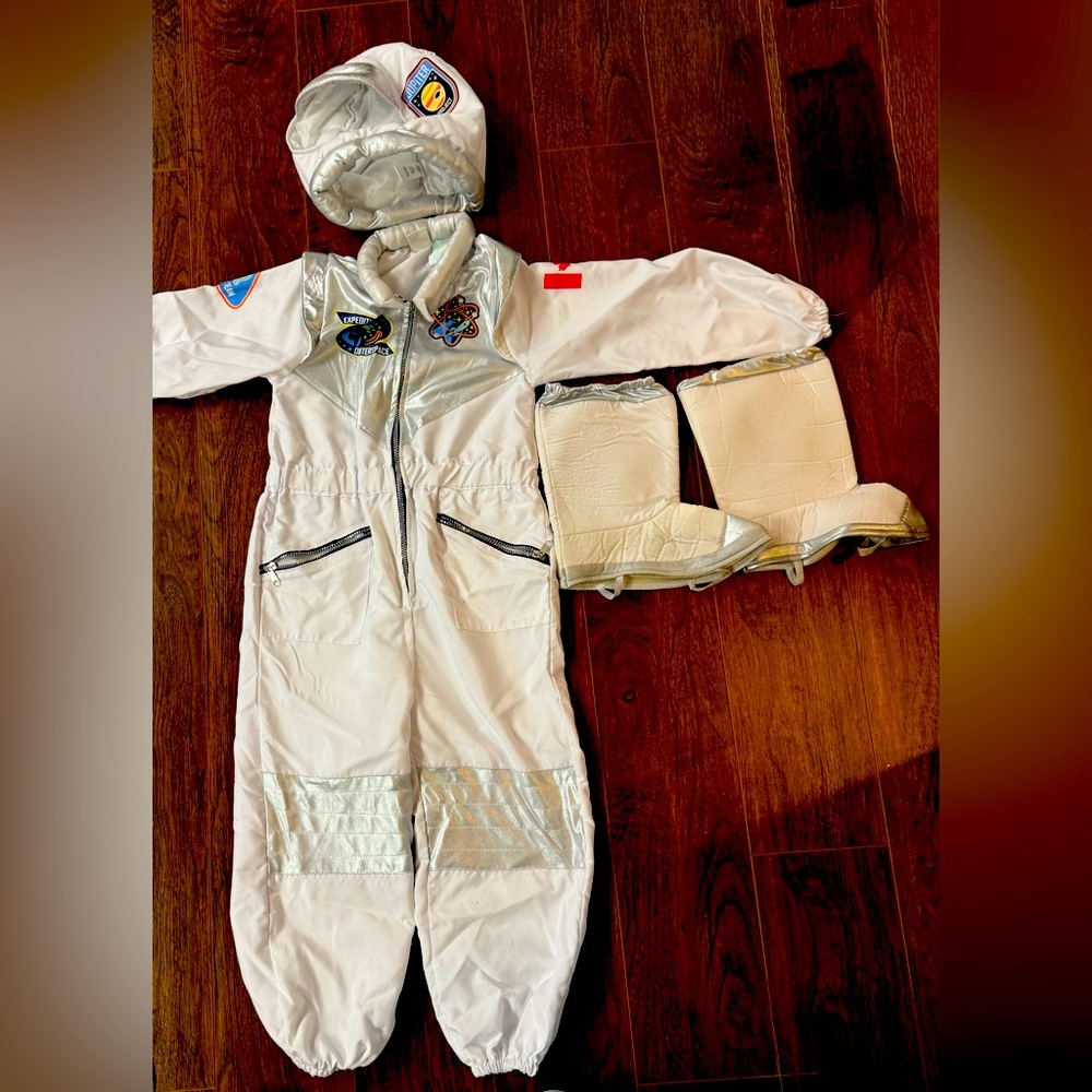 Two astronauts costumes with helmets and boots sizes 4 and 7.